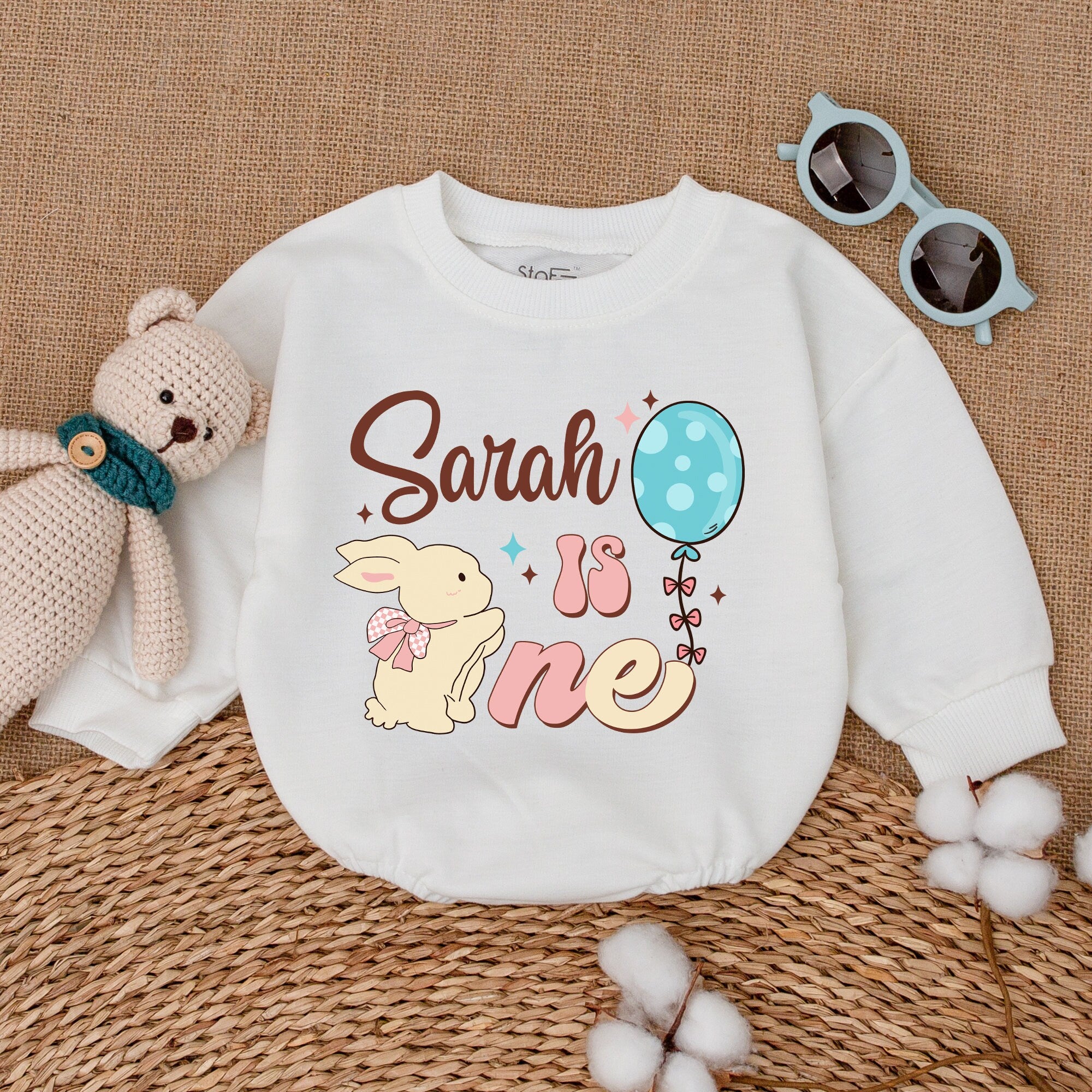 Adorable Custom Bunny Birthday Romper Sarah is One Baby Girl Outfit with Pink Bow and Blue Balloon for Special Celebration