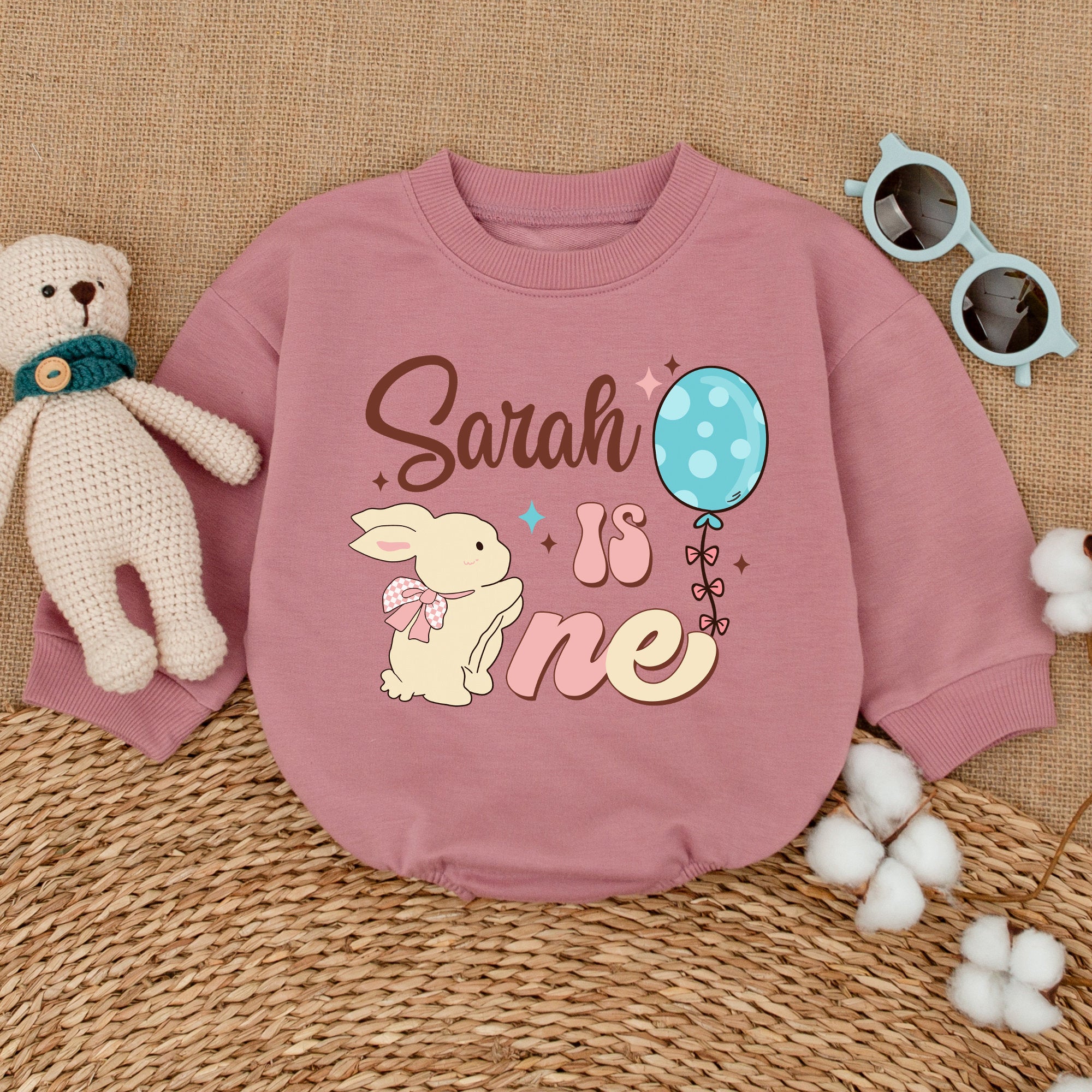 Adorable Custom Bunny Birthday Romper Sarah is One Baby Girl Outfit with Pink Bow and Blue Balloon for Special Celebration