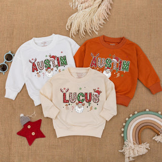 Festive Holiday Kids' Sweatshirt with Santa and Reindeer Artwork, Custom Name Christmas Outfit for Baby and Toddler Boys or Girls