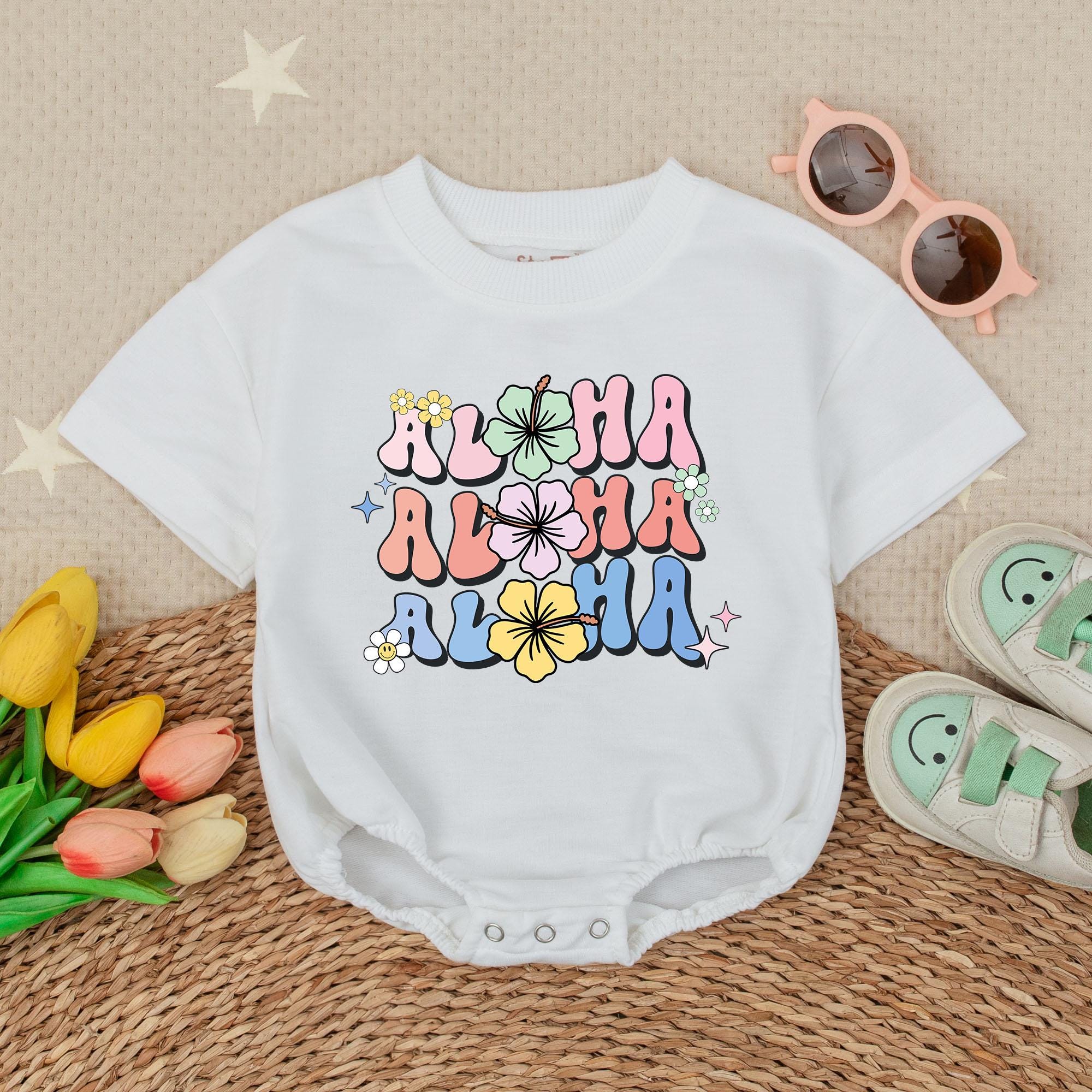 Aloha Hibiscus Flower Baby Girl Romper Vibrant Summer Outfit Hawaiian Vacation Beachwear Playful Pink Peach Blue Design