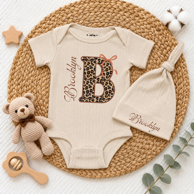Custom Baby Girl Bodysuit & Hat Set with Leopard Print Initial, Retro Bow, and Name, Soft Cotton Newborn Outfit for Baby Shower or Coming Home
