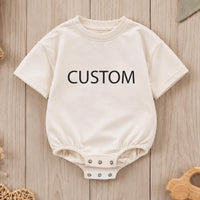 Custom baby romper with bold text print, soft cotton for sensitive skin, matching family outfit for birthdays, holidays, or baby showers