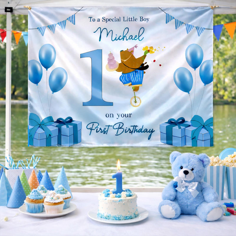 Custom Silk Banner with Bear Riding Unicycle for Boy's 1st Birthday Party, Personalized Backdrop with Name and Blue Balloons