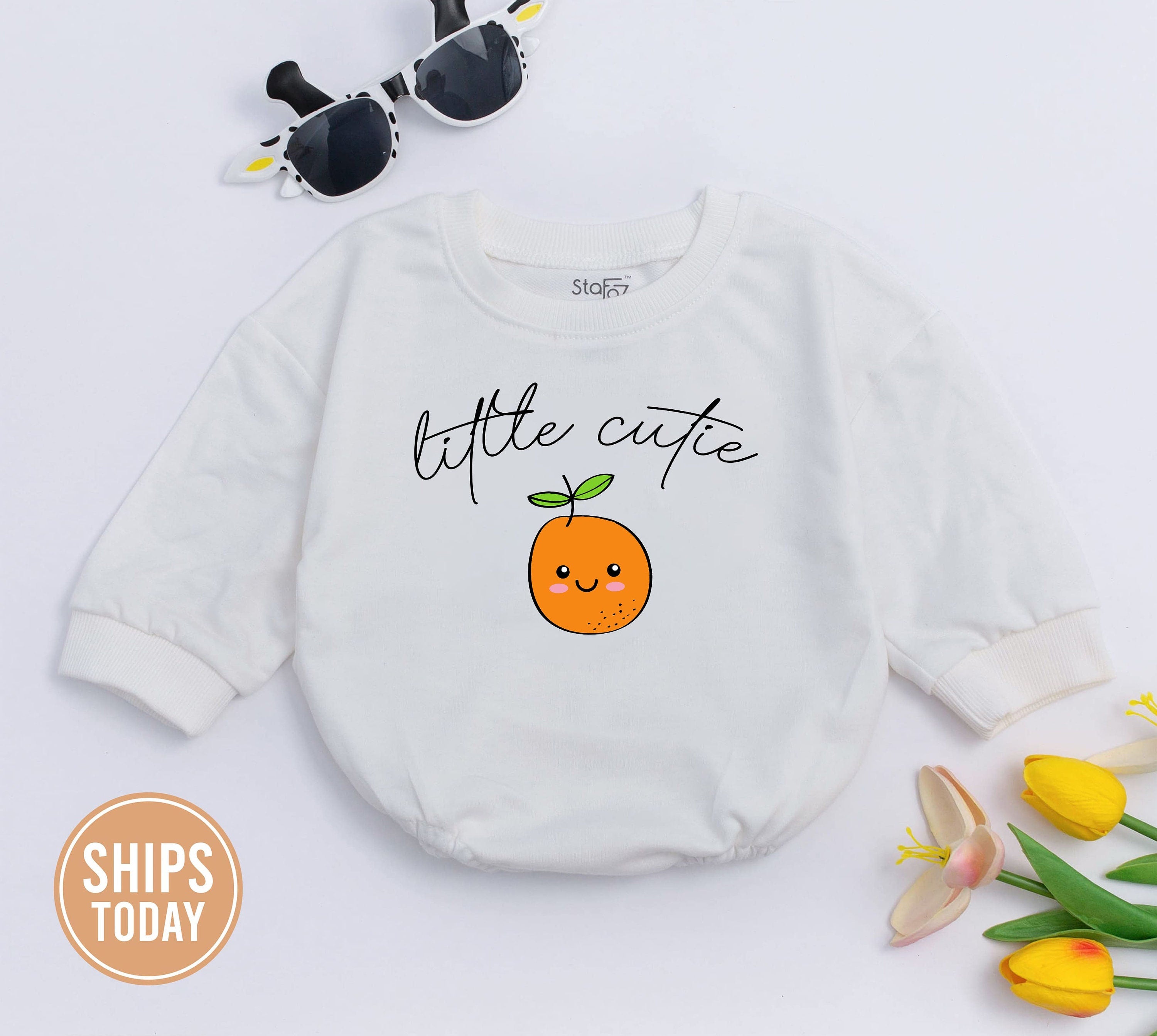 Little Cutie Orange Baby Romper Playful Fruit Design Infant Outfit Sweet Baby Shower Gift Comfortable Cotton Soft Neutral Background