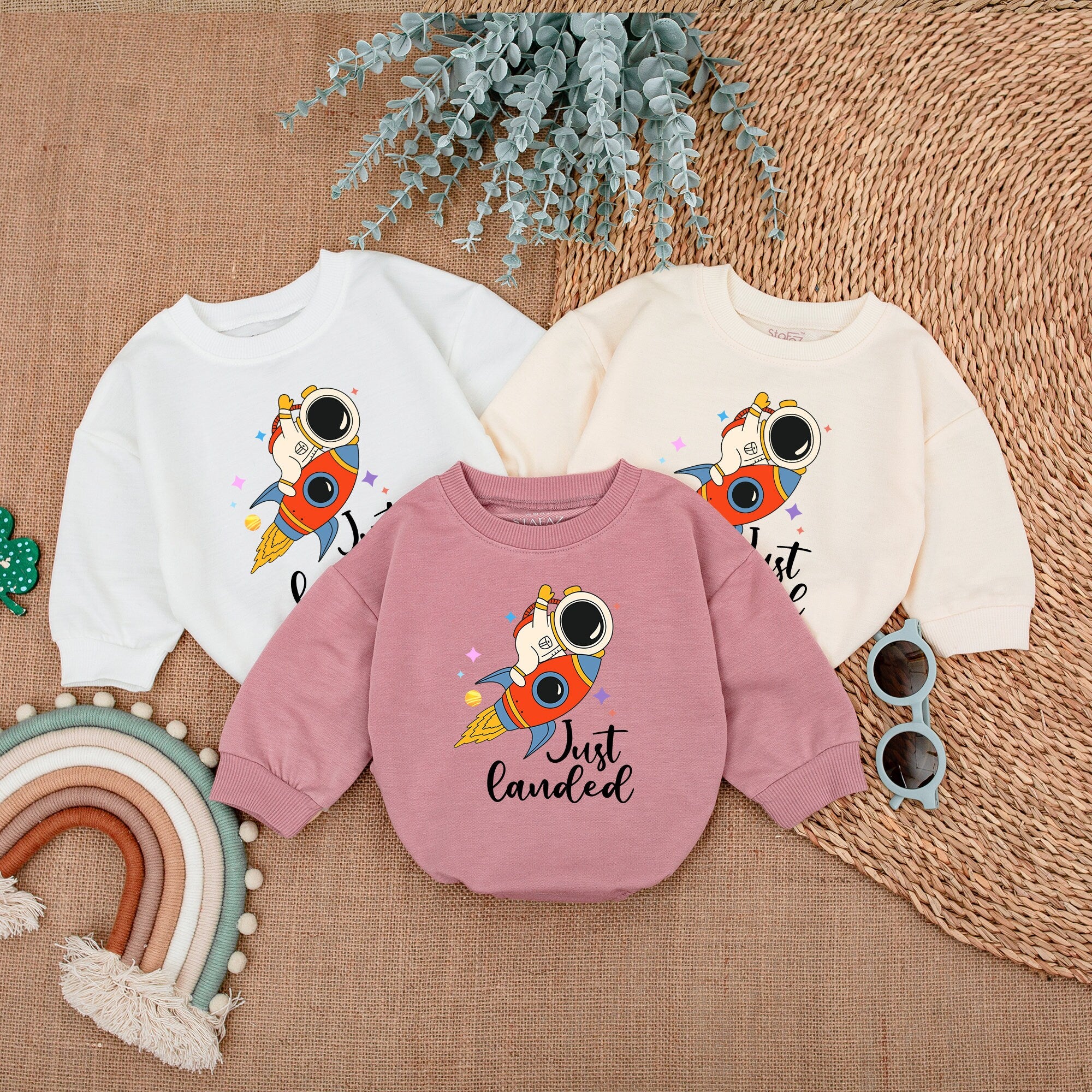 Whimsical Rocket Baby Bodysuit with Astronaut Design