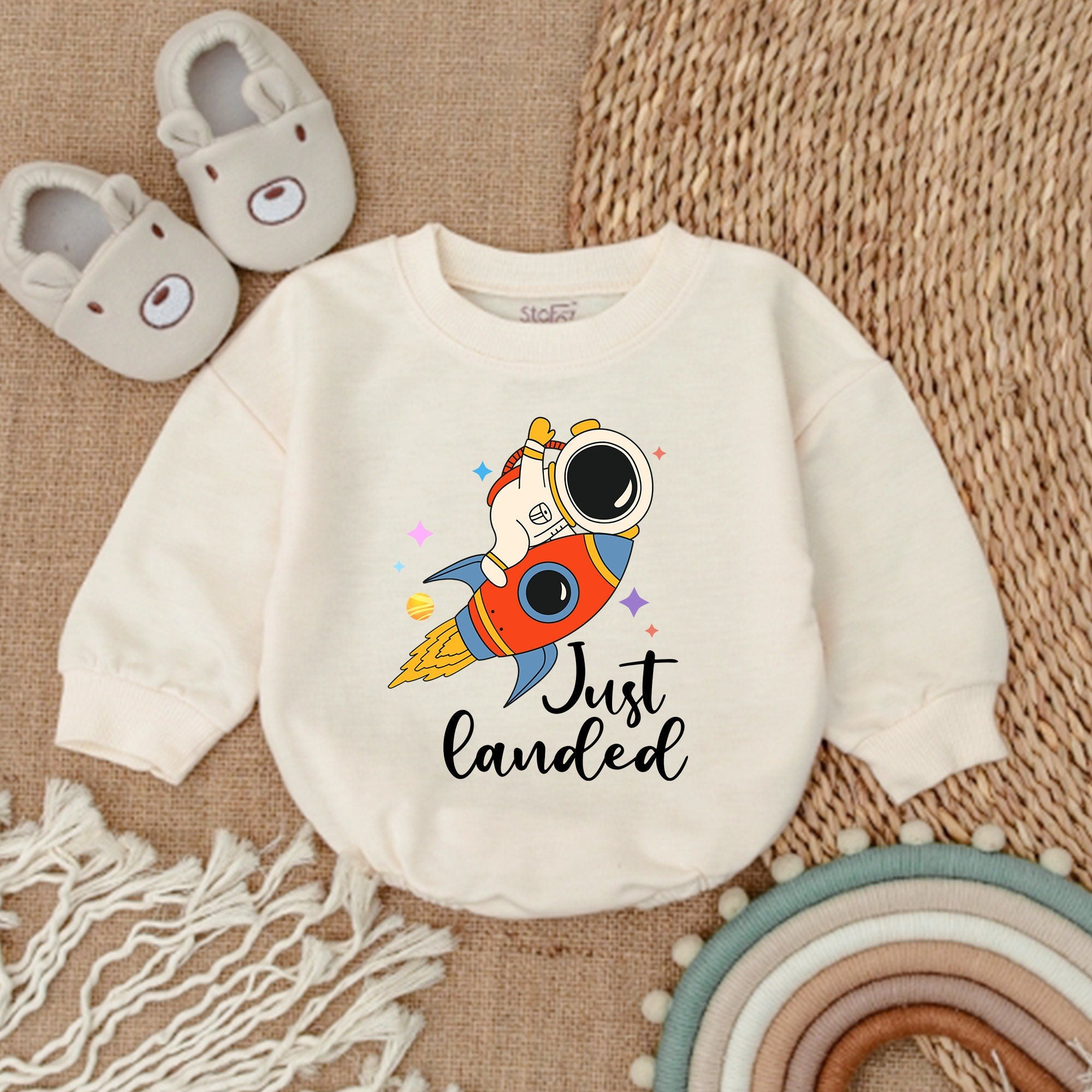 Whimsical Rocket Baby Bodysuit with Astronaut Design