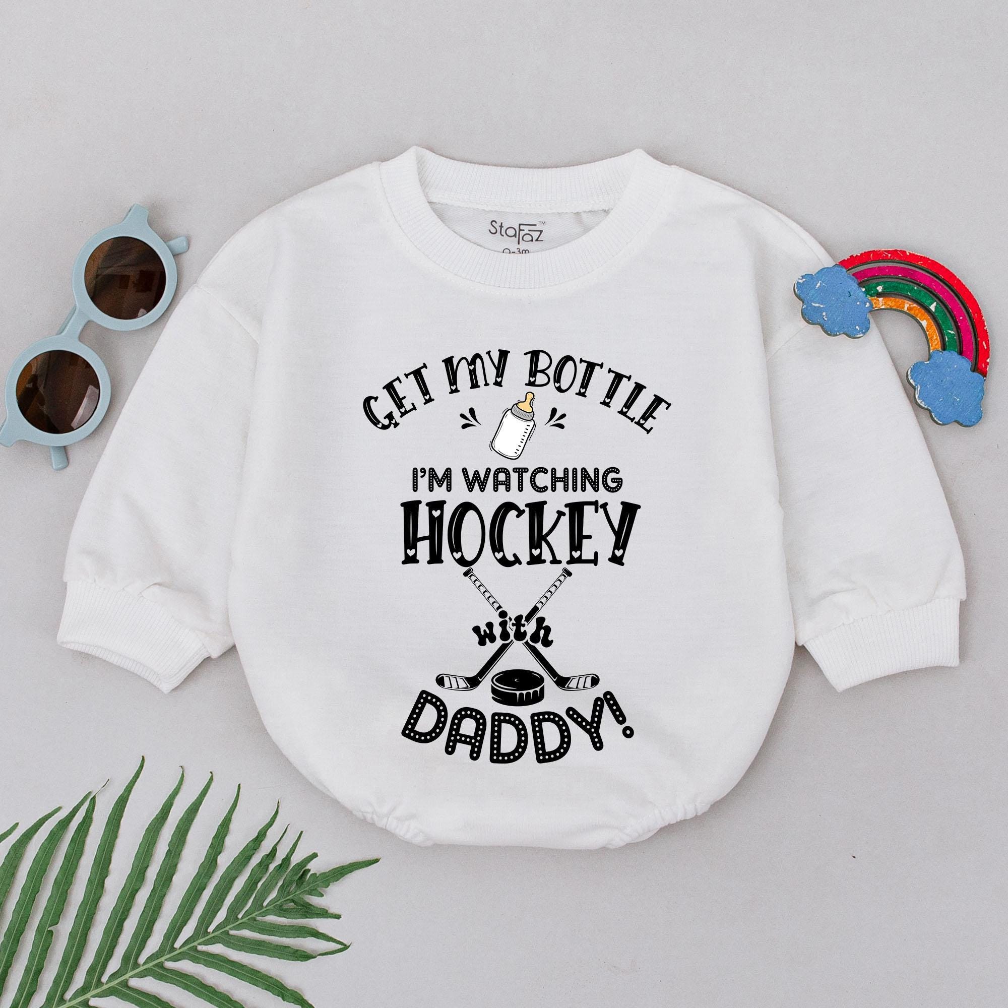 Retro Hockey Baby Romper with Playful Bottle Design