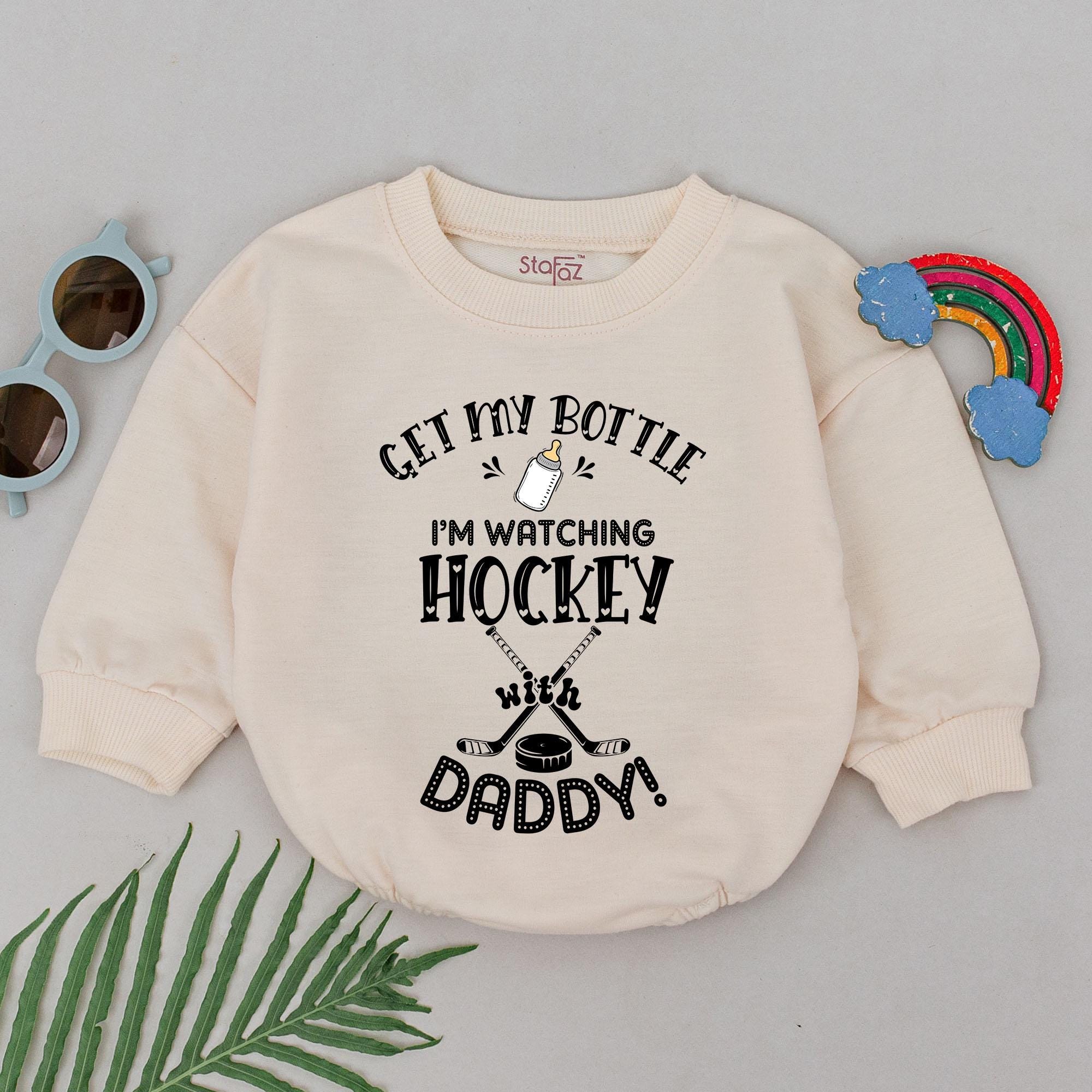 Retro Hockey Baby Romper with Playful Bottle Design