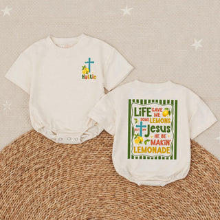 "Life Gave Me Lemons But My Jesus He Be Makin' Lemonade" Baby Girl Bubble Romper with Cross Graphic and Custom Name