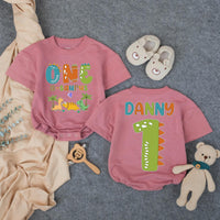 Personalized Dinosaur First Birthday Outfit for Boy with Custom Name, Whimsical Dino Graphics, Soft Cotton Bubble Romper for Party Fun