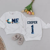 Personalized Space Theme 1st Birthday Sweatshirt for Boys with Galaxy Design, Custom Name and Age, Fun Rocket and Planet Details
