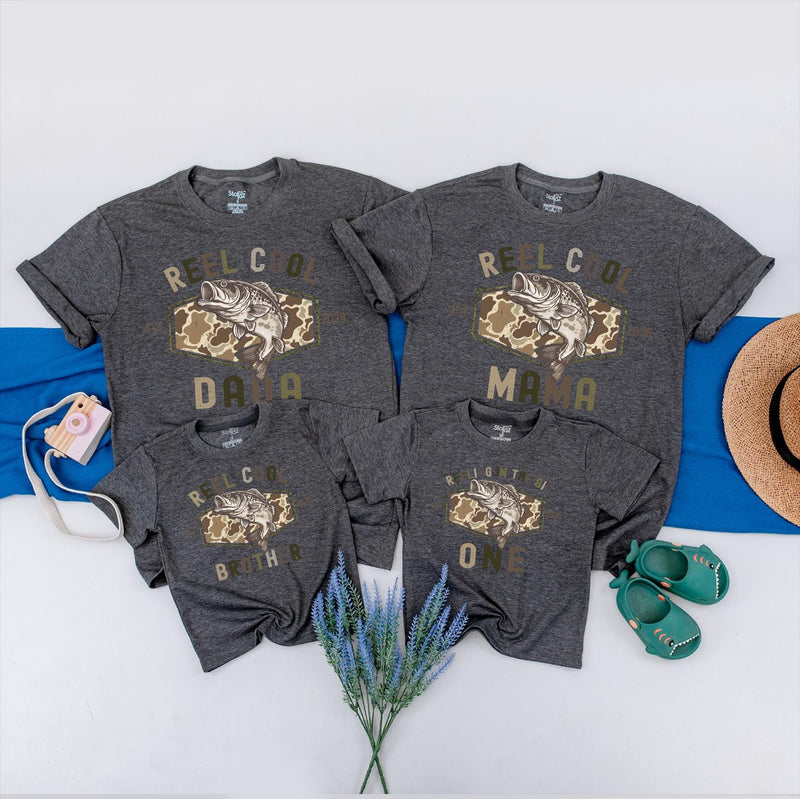 Reeling In The Big One Matching Family Shirts Reel Cool Camo Fishing Outfit Personalized 1st Birthday Toddler Baby Gift Cotton Tees